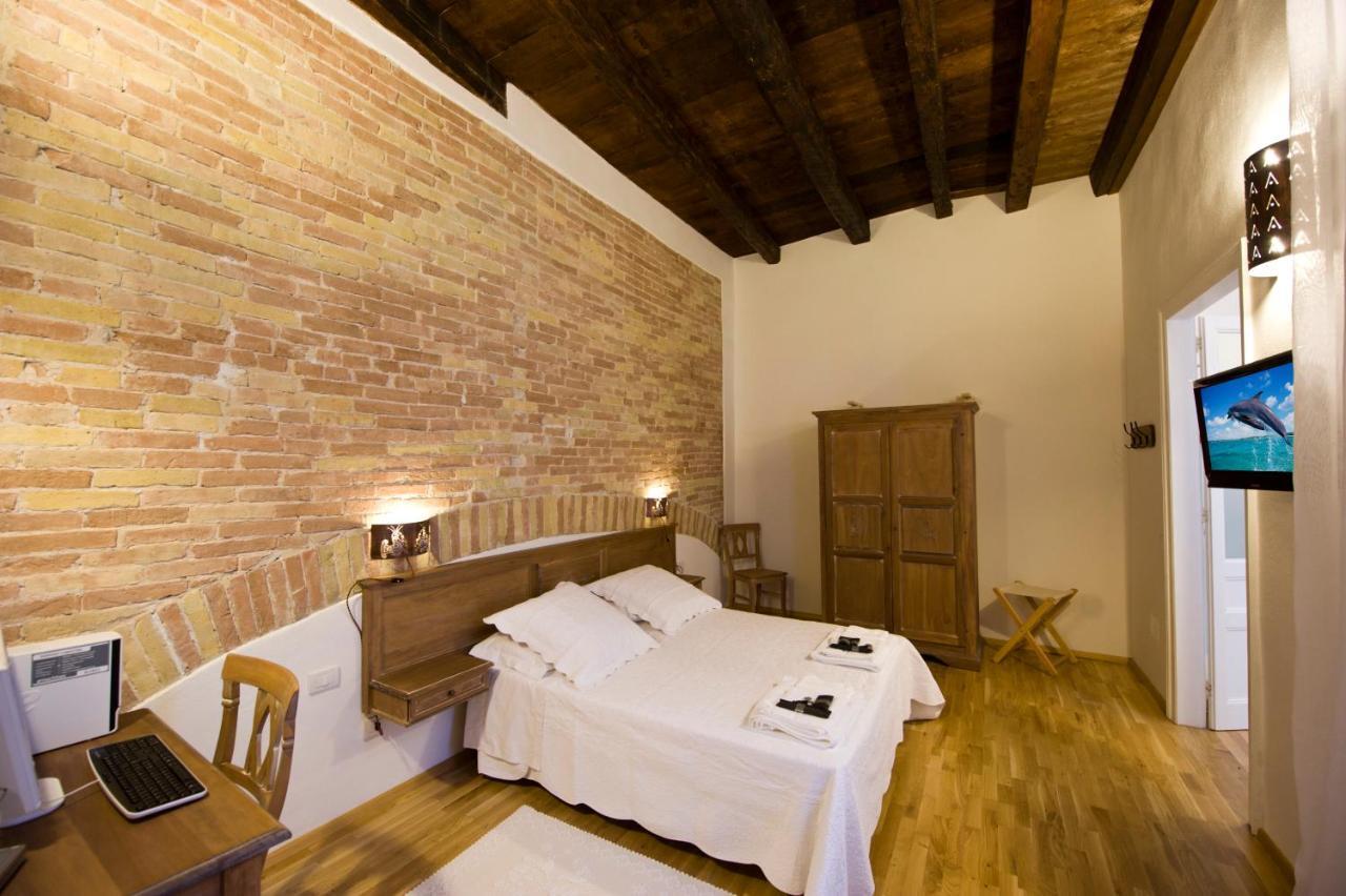 Castelletto Suites Cagliari Bilik gambar